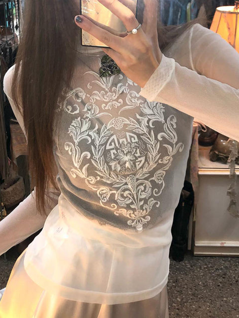 white-graphic-print-turtleneck-mesh-top-1