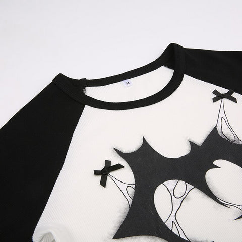 gothic-bow-printed-graphic-knitted-slim-top-7