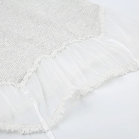 white-camisole-ruffles-spliced-bow-top-7