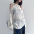 white-ripped-oversize-open-shoulder-knitted-sweater-4