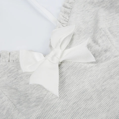 white-camisole-ruffles-spliced-bow-top-5