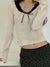 white-patched-slim-bow-long-sleeves-top-1