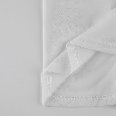 Blusa transparente de malla de patchwork con volantes blanca